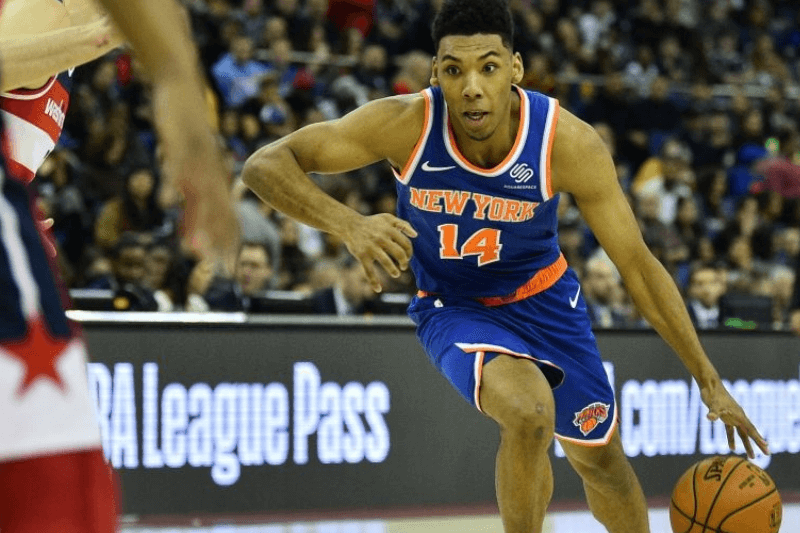 New York Knicks' Allonzo Trier (R) dribbles the ball during the NBA London Game 2019 basketball game between Washington Wizards and New York Knicks at the O2 Arena in London on January 17, 2019.