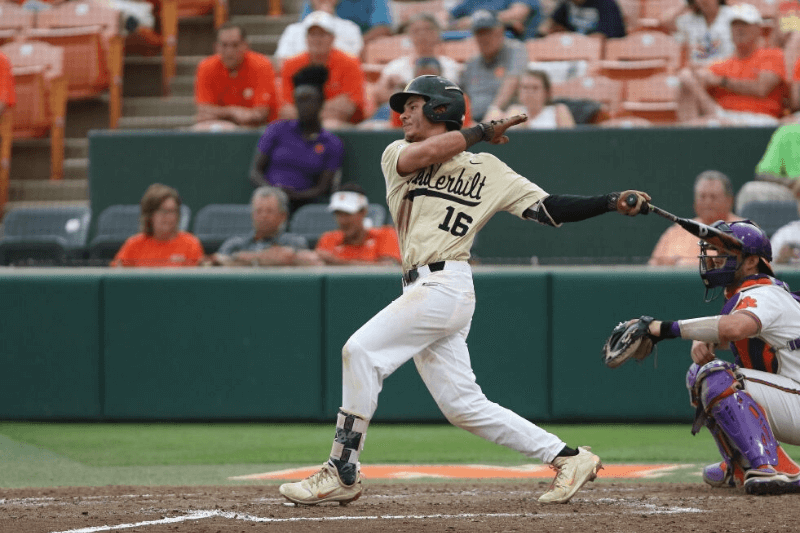 CLEMSON, SC - JUNE 03: Vanderbilt and Clemson played against one another in the NCAA 2018 Division I Baseball Championship regional match up on June 3, 2018 at Doug Kingsmore Stadium in Clemson, S.C. Austin Martin (16) of Vanderbilt hits the ball for a double