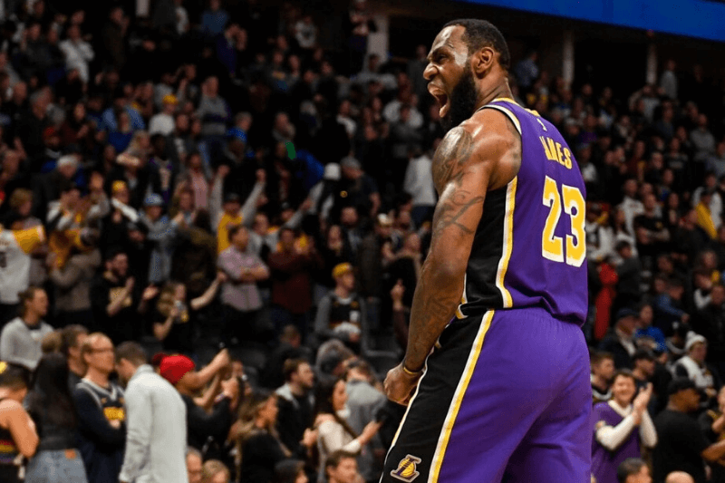 DENVER, CO - FEBRUARY 12: LeBron James (23) of the Los Angeles Lakers celebrates the final horn against the Denver Nuggets during overtime quarter of Los Angeles' 120-116 win on Wednesday, February 12, 2020. 