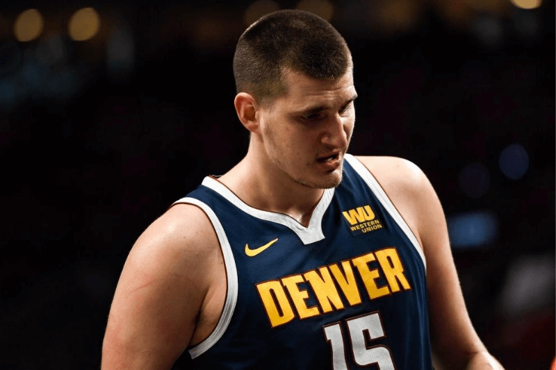 PORTLAND, OR - MAY 5: Nikola Jokic (15) of the Denver Nuggets heads to the bench for a timeout against the Portland Trail Blazers during the first quarter on Sunday, May 5, 2019. The Denver Nuggets and the Portland Trail Blazers game four of their second round NBA playoff series at the Moda Center in Portland.
