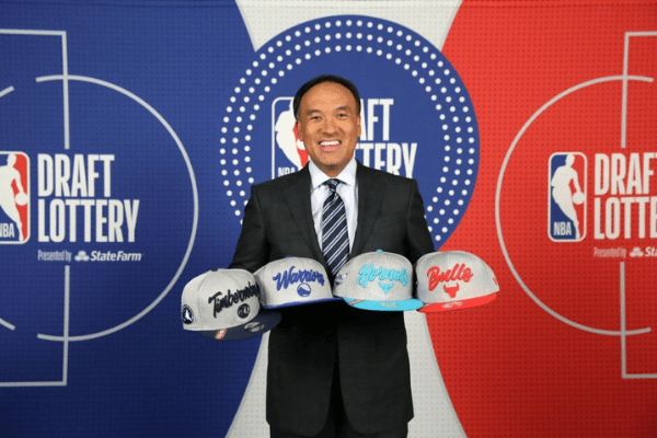 SECAUCUS, NJ - AUGUST 20: Deputy Commissioner of the NBA, Mark Tatum holds up the team hats of the Golden State Warriors, Minnesota Timberwolves, Charlotte Hornets and Charlotte Hornets during the 2020 NBA Draft Lottery on August 20, 2020 at the NBA Entertainment Studios in Secaucus, New Jersey. NOTE TO USER: User expressly acknowledges and agrees that, by downloading and/or using this photograph, user is consenting to the terms and conditions of the Getty Images License Agreement. Mandatory Copyright Notice: Copyright 2020 NBAE