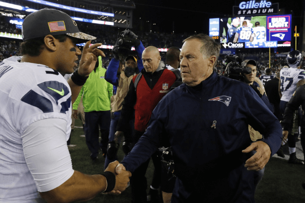 Nov 13, 2016; Foxborough, MA, USA; New England Patriots head coach Bill Belichick greets Seattle Seahawks quarterback Russell Wilson (3) after the game at Gillette Stadium. Seattle Seahawks defeated the Patriots 31-24.