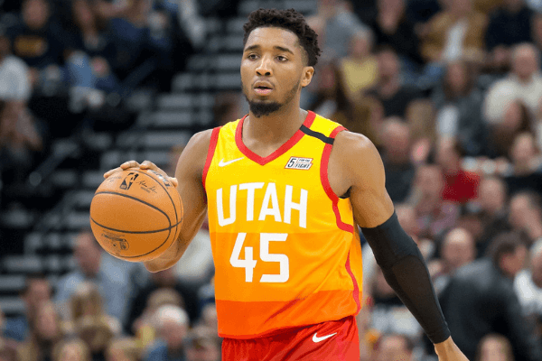 Jan 20, 2020; Salt Lake City, Utah, USA; Utah Jazz guard Donovan Mitchell (45) dribbles up the court during the second half against the Indiana Pacers at Vivint Smart Home Arena. Mandatory Credit: Russell Isabella-USA TODAY Sports