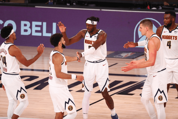 Sep 26, 2020; Lake Buena Vista, Florida, USA; Denver Nuggets players celebrate a play against the Los Angeles Lakers during the third quarter in game five of the Western Conference Finals of the 2020 NBA Playoffs at AdventHealth Arena.