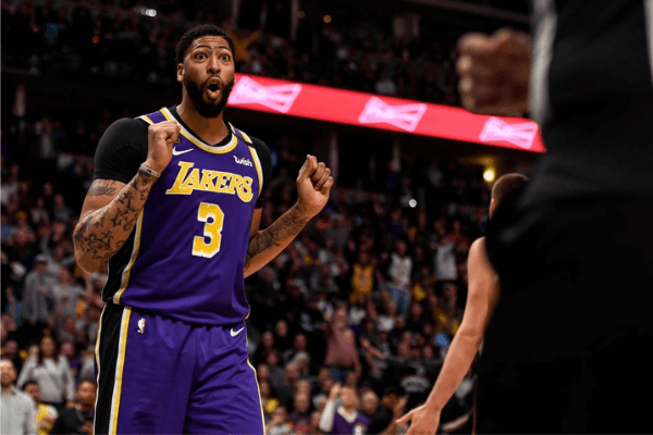 Anthony Davis (3) of the Los Angeles Lakers reacts to a call, while playing the Denver Nuggets during the fourth quarter of Los Angeles' 120-116 win on Wednesday, February 12, 2020.