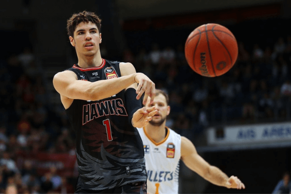 Lamelo Ball of the Hawks passes during the round five NBL match between the Illawarra Hawks and the Brisbane Bullets at AIS Arena on November 03, 2019 in Canberra, Australia.