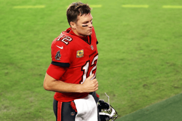Tom Brady #12 of the Tampa Bay Buccaneers jogs off the field after being defeated by the New Orleans Saints 38-3 at Raymond James Stadium on November 08, 2020 in Tampa, Florida