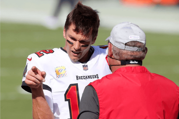 Tom Brady (12) of the Buccaneers talks with Head Coach Bruce Arians before the regular season game between the Green Bay Packers and the Tampa Bay Buccaneers on October 18, 2020 at Raymond James Stadium in Tampa, Florida.