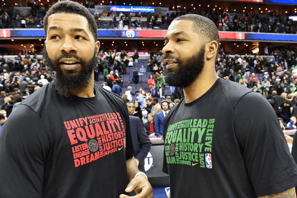 Feb 8, 2018; Washington, DC, USA; Washington Wizards forward Markieff Morris (left) talks with twin brother Boston Celtics forward Marcus Morris (right) after the game at Capital One Arena.