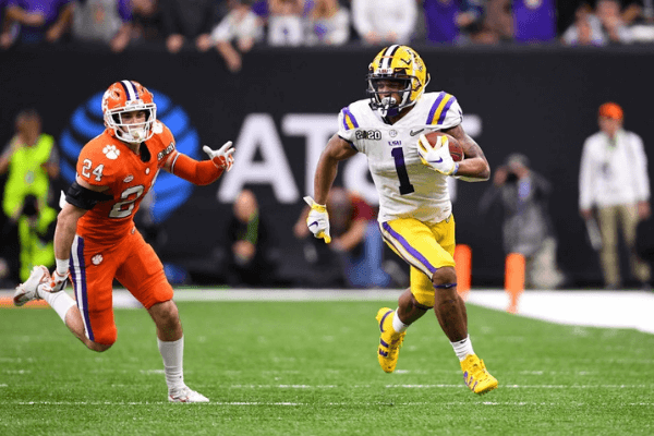 Ja'Marr Chase #1 of the LSU Tigers races past Nolan Turner #24 of the Clemson Tigers during the College Football Playoff National Championship held at the Mercedes-Benz Superdome on January 13, 2020 in New Orleans, Louisiana.