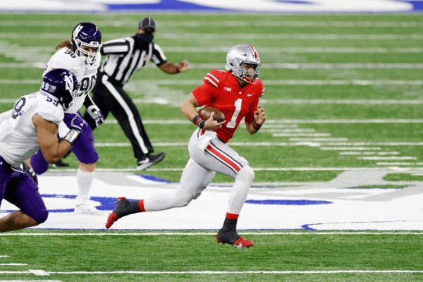 Justin Fields #1 of the Ohio State Buckeyes runs the ball in the first quarter against the Northwestern Wildcats during the Big Ten Championship at Lucas Oil Stadium on December 19, 2020 in Indianapolis, Indiana.