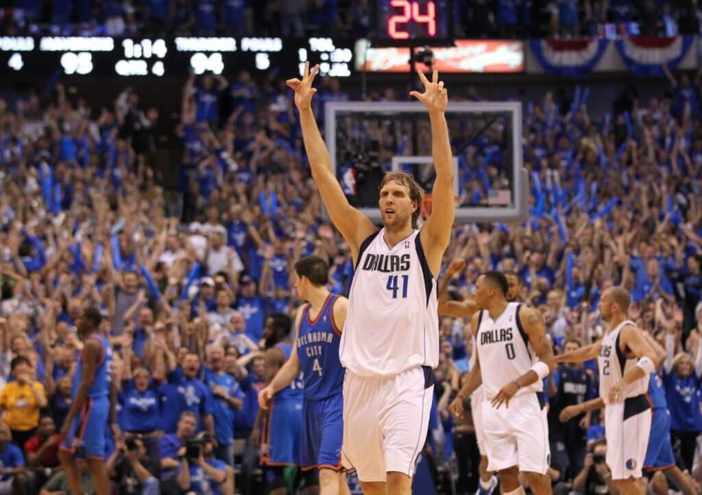 May 25, 2011; Dallas, TX, USA; Dallas Mavericks forward Dirk Nowitzki (41) celebrates after hitting a three point basket in the fourth quarter of game five against the Oklahoma City Thunder for the Western Conference Finals of the 2011 NBA playoffs at American Airlines Center. The Mavs beat the Thunder 100-96. Mandatory Credit: Matthew Emmons-USA TODAY Sports