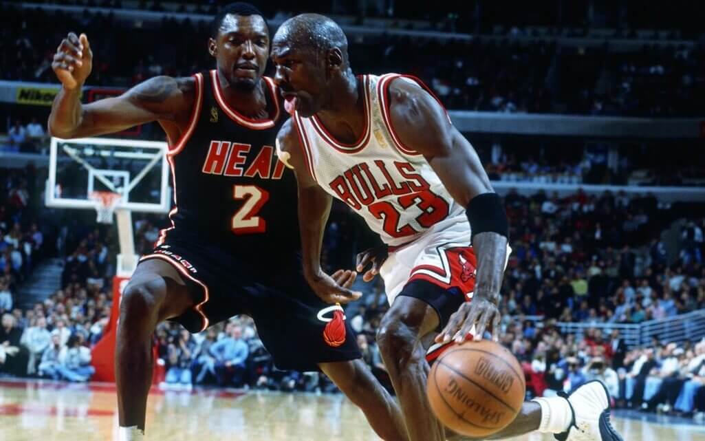 Unknown Date; Chicago, IL, USA; FILE PHOTO; Chicago Bulls guard (23) Michael Jordan drives against Miami Heat guard (2) Keith Askins at the United Center. Mandatory Credit: Photo By Brian Spurlock-USA TODAY Sports (c) Copyright 1997 Brian Spurlock