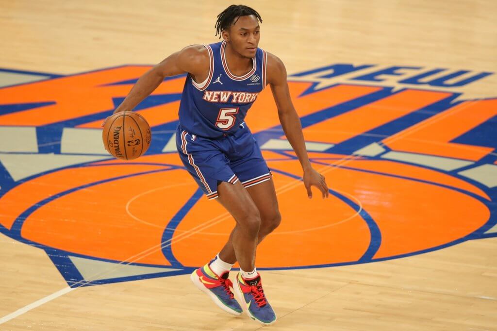 New York Knicks shooting guard Immanuel Quickley (5) brings the ball up court against the LA Clippers during the third quarter at Madison Square Garden.