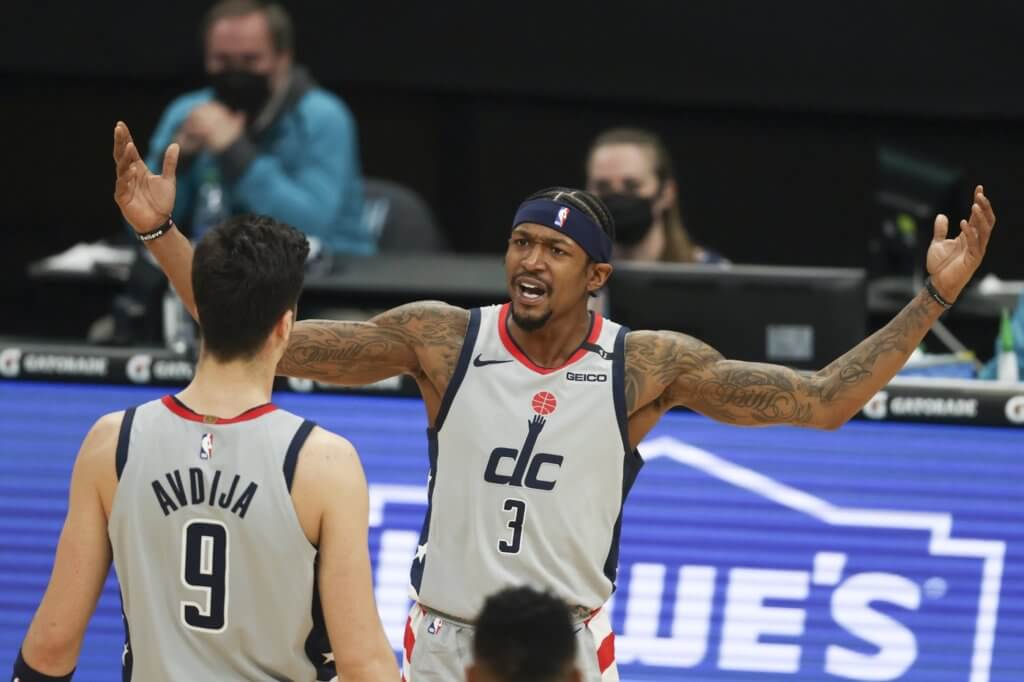 Feb 7, 2021; Charlotte, North Carolina, USA; Washington Wizards guard Bradley Beal (3) yells at forward Deni Avdija (9) as they play against the Charlotte Hornets in the first half at Spectrum Center. Mandatory Credit: Nell Redmond-USA TODAY Sports