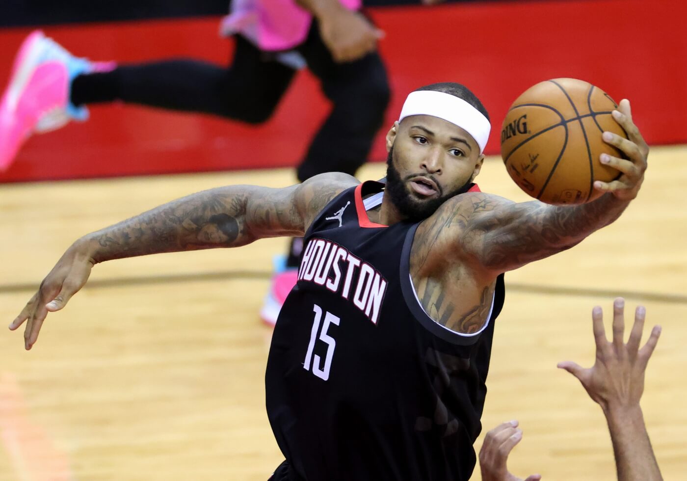 Houston Rockets center DeMarcus Cousins (15) reaches for a rebound during the second quarter against the Miami Heat at Toyota Center.