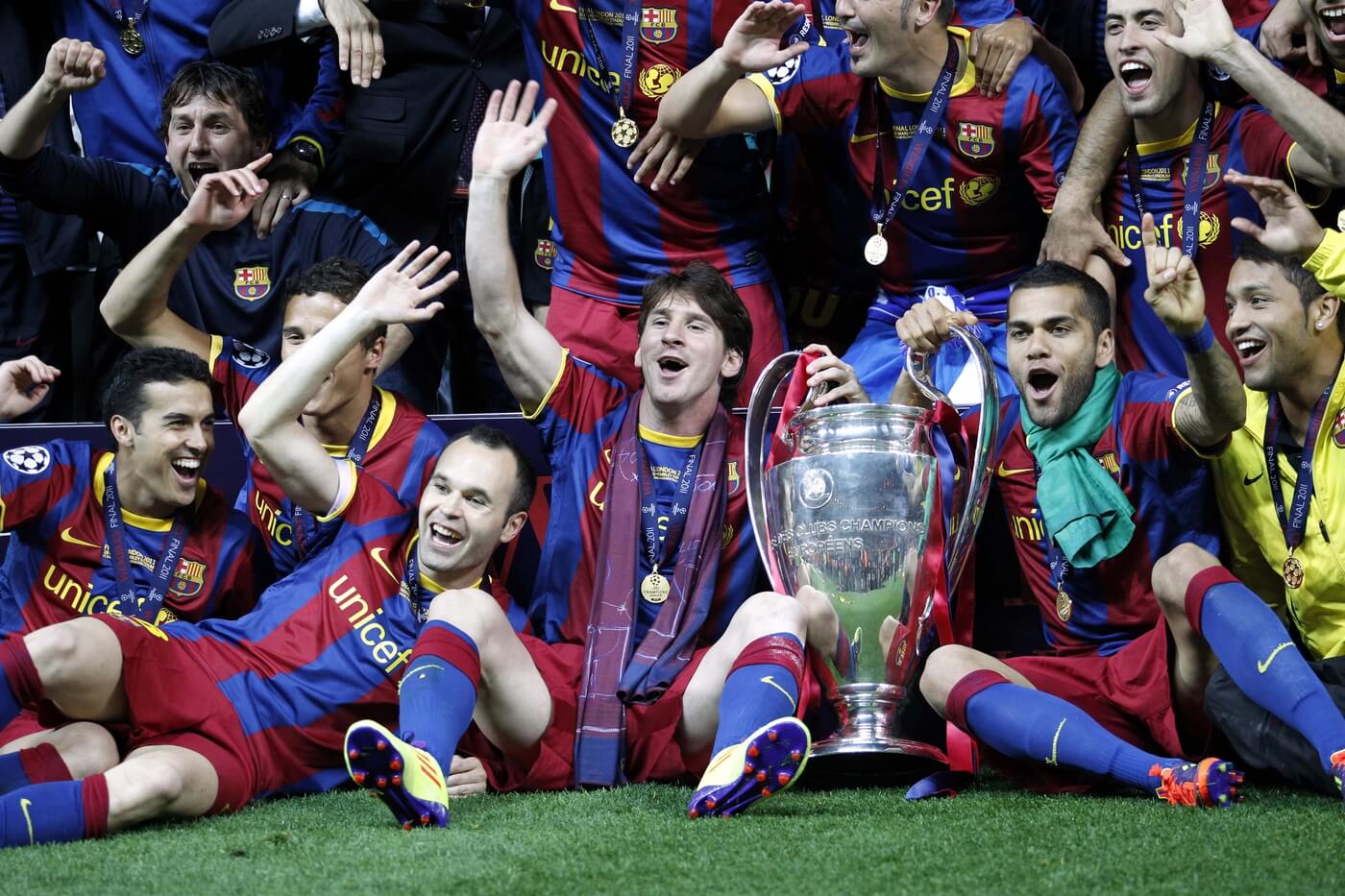 May 28, 2011; London, ENGLAND; FC Barcelona player Lionel Messi (middle) and his teammates celebrate with the championship trophy after defeating Manchester United 3-1 in the 2011 UEFA Champions League final at Wembley Stadium. Mandatory Credit: Walter Luger/GEPA via USA TODAY Sports