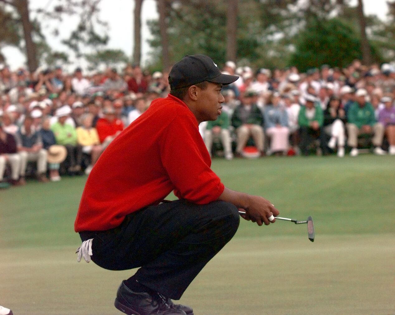 April 13, 1997; Augusta, GA, USA; Tiger Woods waits his turn at the 18th hole before winning the 1997 Masters. Mandatory Credit: Porter Binks/USA TODAY