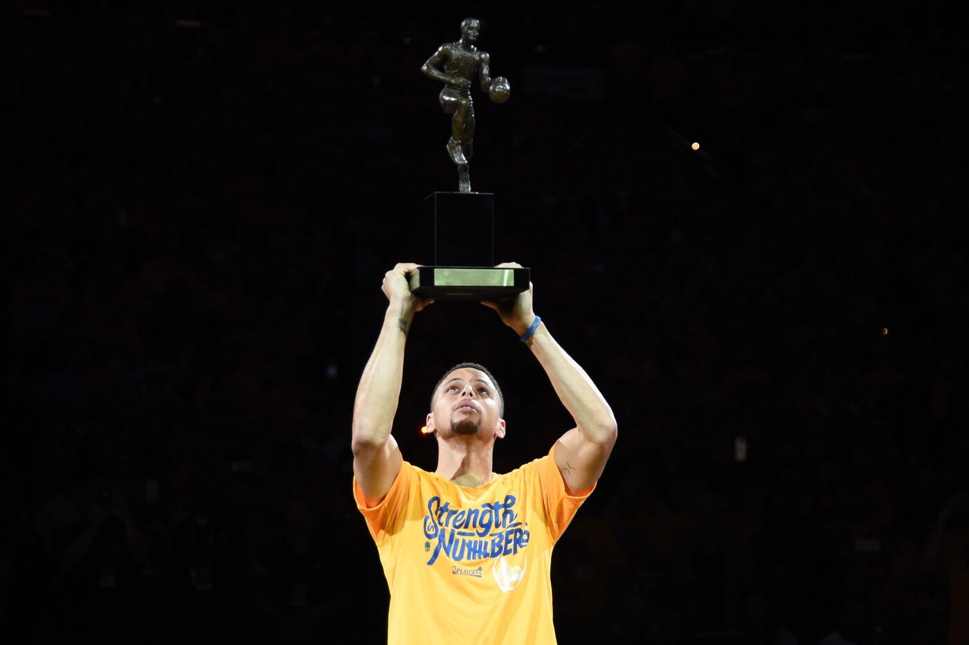 May 11, 2016; Oakland, CA, USA; Golden State Warriors guard Stephen Curry (30) hoists the MVP trophy before game five of the second round of the NBA Playoffs against the Portland Trail Blazers at Oracle Arena. Mandatory Credit: Kyle Terada-USA TODAY Sports