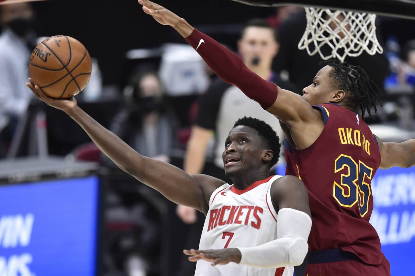 Feb 24, 2021; Cleveland, Ohio, USA; Houston Rockets guard Victor Oladipo (7) drives against Cleveland Cavaliers guard Isaac Okoro (35) in the fourth quarter at Rocket Mortgage FieldHouse. Mandatory Credit: David Richard-USA TODAY Sports