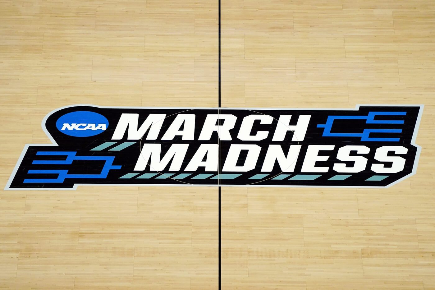 Mar 21, 2021; Indianapolis, Indiana, USA; The March Madness logo in center court before the game between the Loyola Ramblers and the Illinois Fighting Illini in the second round of the 2021 NCAA Tournament at Bankers Life Fieldhouse.