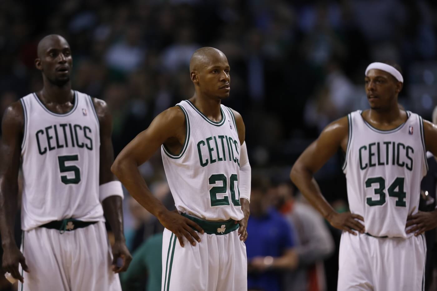 May 14, 2012; Boston, MA, USA; Boston Celtics shooting guard Ray Allen (20), small forward Paul Pierce (34) and power forward Kevin Garnett (5) react as they take on the Philadelphia 76ers during the fourth quarter in game two of the Eastern Conference semifinals of the 2012 NBA Playoffs at TD Garden. The Philadelphia 76ers defeated the Boston Celtics 82-81.