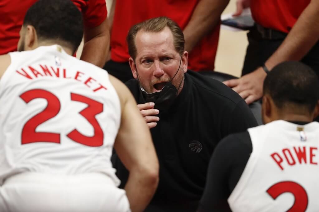 Mar 17, 2021; Detroit, Michigan, USA; Toronto Raptors head coach Nick Nurse talks to his team in a huddle during the fourth quarter against the Detroit Pistons at Little Caesars Arena. Mandatory Credit: Raj Mehta-USA TODAY Sports