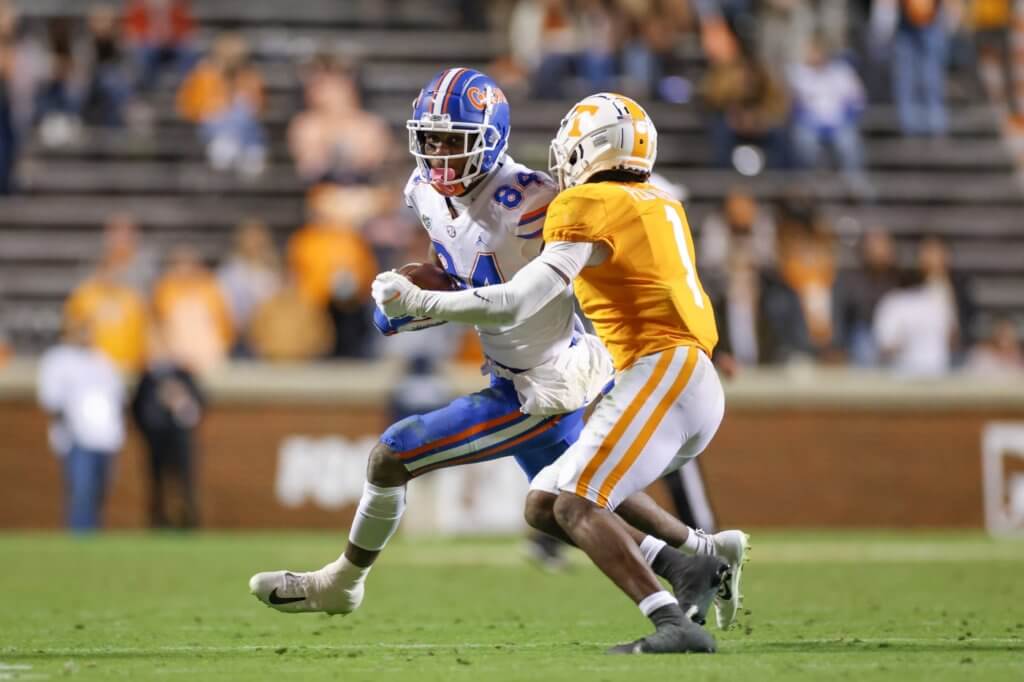 Dec 5, 2020; Knoxville, Tennessee, USA; Florida Gators tight end Kyle Pitts (84) runs with the ball against Tennessee Volunteers defensive back Trevon Flowers (1) during the second half at Neyland Stadium. Mandatory Credit: Randy Sartin-USA TODAY Sports