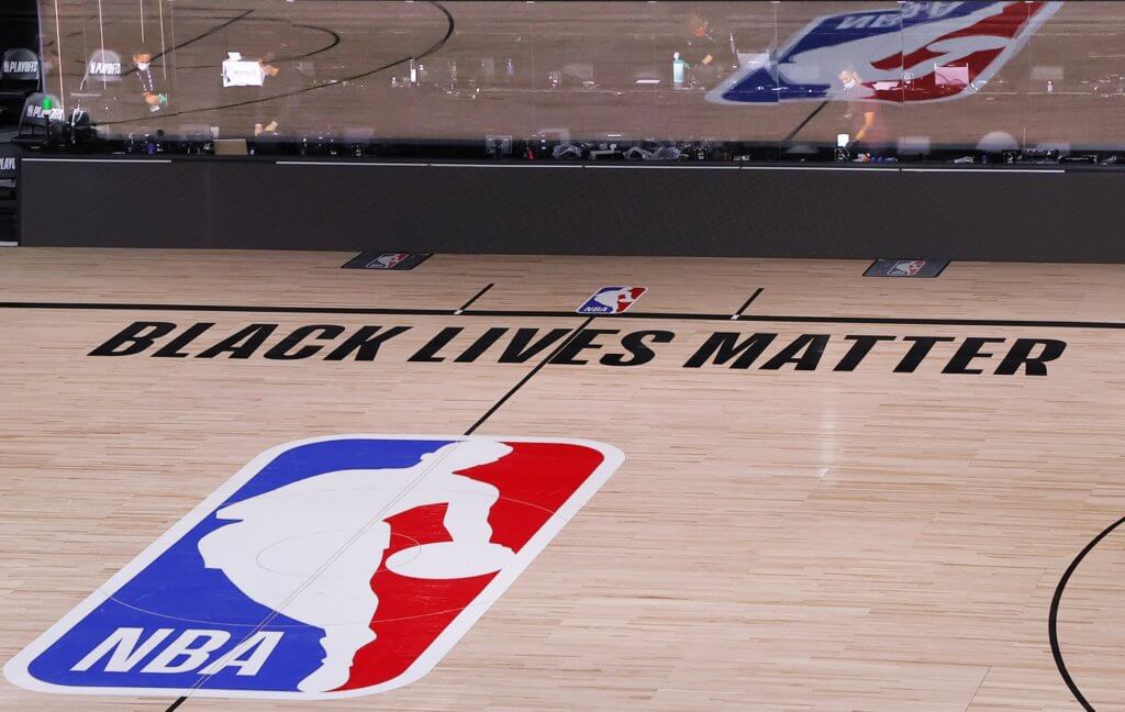 An empty court and bench is shown with no signage following the scheduled start time in Game Five of the Eastern Conference First Round between the Milwaukee Bucks and the Orlando Magic during the 2020 NBA Playoffs at AdventHealth Arena at ESPN Wide World Of Sports Complex on August 26, 2020 in Lake Buena Vista, Florida. The Milwaukee Buck have boycotted game 5 reportedly to protest the shooting of Jacob Blake in Kenosha, Wisconsin