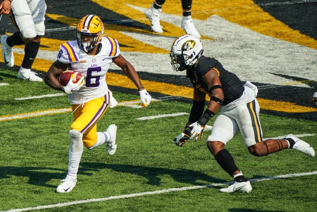 LSU Tigers wide receiver Terrace Marshall Jr. (6) runs against Missouri Tigers safety Martez Manuel (3) during the second half at Faurot Field at Memorial Stadium.