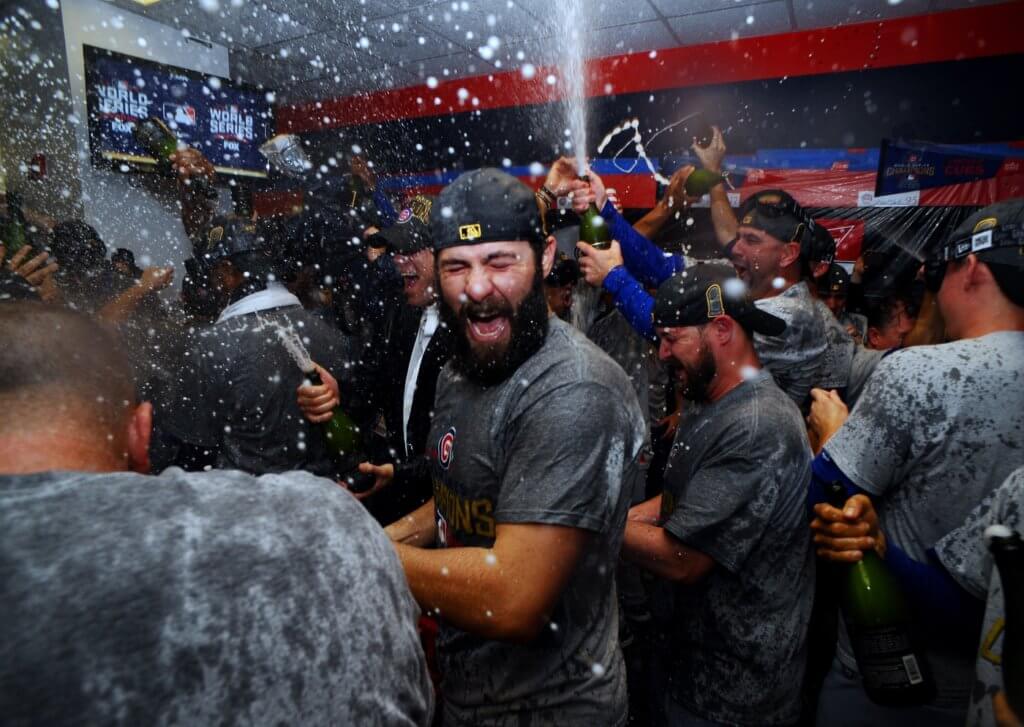 Nov 2, 2016; Cleveland, OH, USA; Chicago Cubs starting pitcher Jake Arrieta celebrates in the clubhouse after defeating the Cleveland Indians in game seven of the 2016 World Series at Progressive Field. Mandatory Credit: Ken Blaze-USA TODAY Sports