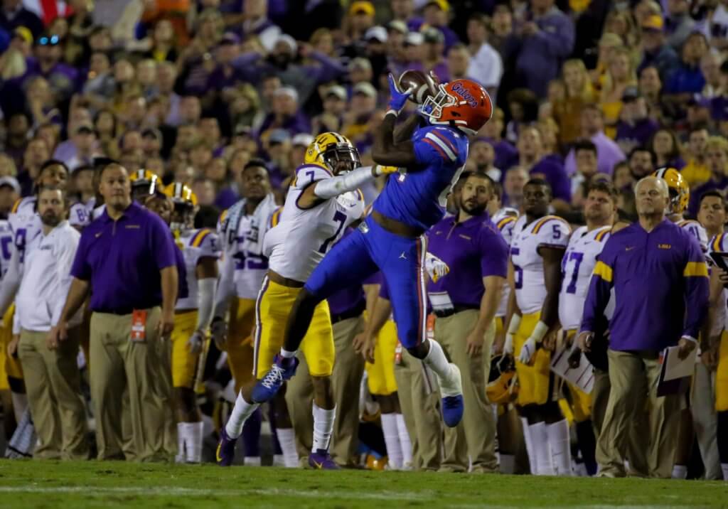 Oct 12, 2019; Baton Rouge, LA, USA; Florida Gators tight end Kyle Pitts (84) catches a pass over LSU Tigers safety Grant Delpit (7) during the first half at Tiger Stadium. Mandatory Credit: Derick E. Hingle-USA TODAY Sports
