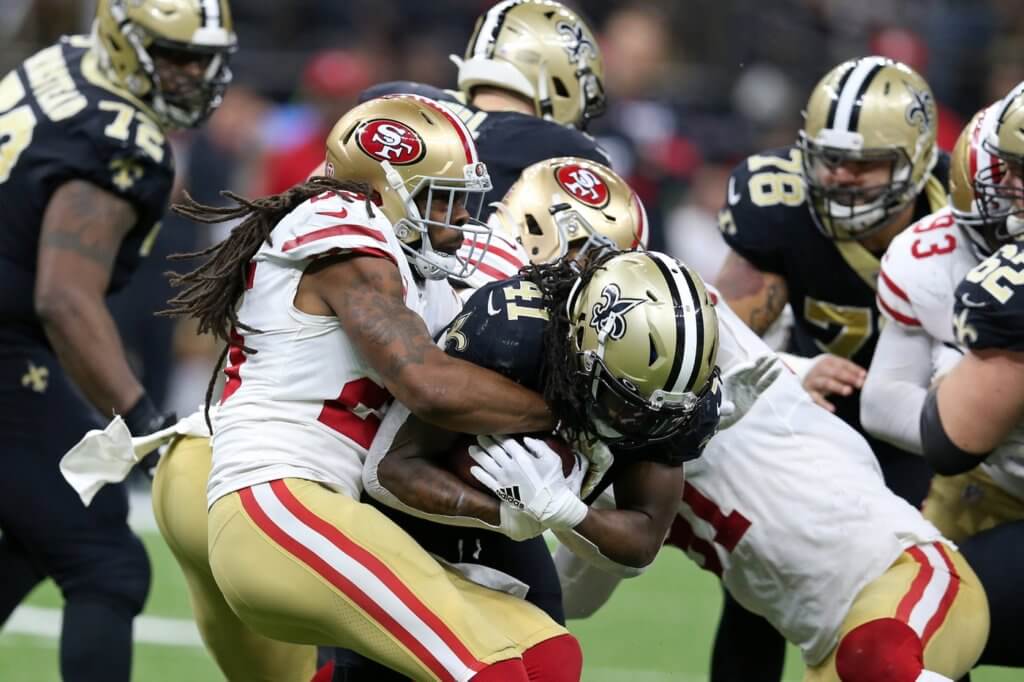 Dec 8, 2019; New Orleans, LA, USA; New Orleans Saints running back Alvin Kamara (41) is tackled by San Francisco 49ers cornerback Richard Sherman (25) in the second half at the Mercedes-Benz Superdome. The 49ers won, 48-46. Mandatory Credit: Chuck Cook-USA TODAY Sports