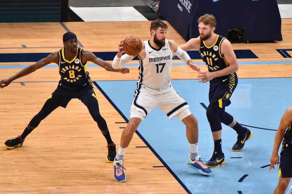 Apr 11, 2021; Memphis, Tennessee, USA; Memphis Grizzlies center Jonas Valanciunas (17) handles the ball against Indiana Pacers forward Domantas Sabonis (11) during the second half at FedExForum. Mandatory Credit: Justin Ford-USA TODAY Sports