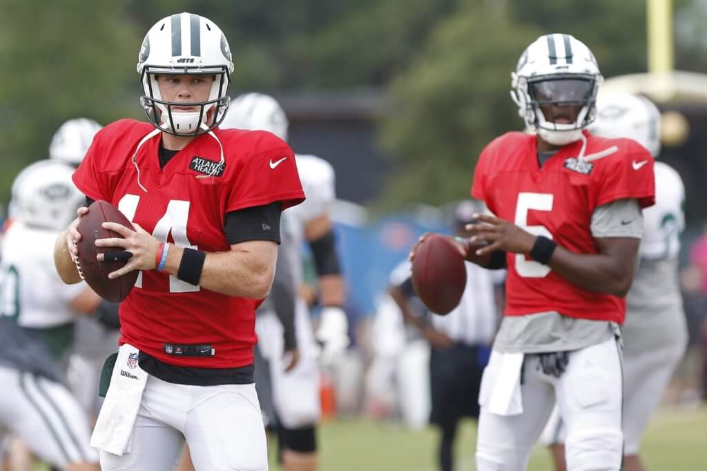 Aug 13, 2018; Washington, DC, USA; New York Jets quarterback Sam Darnold (14) and New York Jets quarterback Teddy Bridgewater (5) participate in drills during a joint practice with the Washington Redskins at Bon Secours Washington Redskins Training Center. Mandatory Credit: Geoff Burke-USA TODAY Sports