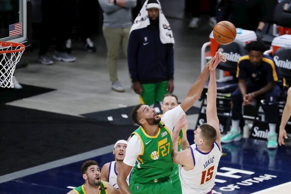 May 7, 2021; Salt Lake City, Utah, USA; Utah Jazz center Rudy Gobert (27) blocks the shot of Denver Nuggets center Nikola Jokic (15) in the fourth quarter at Vivint Arena. Mandatory Credit: Rob Gray-USA TODAY Sports