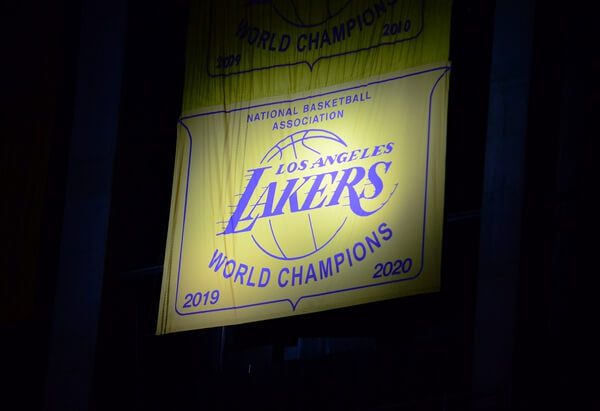 May 12, 2021; Los Angeles, California, USA; The Los Angeles Lakers 2020 champions banner is revealed before the game against the Houston Rockets at Staples Center. Mandatory Credit: Gary A. Vasquez-USA TODAY Sports