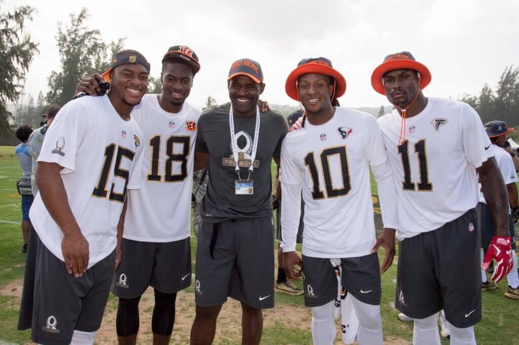 January 28, 2016; Kahuku, HI, USA; Team Irvin wide receiver Allen Robinson of the Jacksonville Jaguars (15), wide receiver A.J. Green of the Cincinnati Bengals (18), alumni captain Michael Irvin (center), wide receiver DeAndre Hopkins of the Houston Texans (10), and wide receiver Julio Jones of the Atlanta Falcons (11) pose for a photo during the 2016 Pro Bowl practice at Turtle Bay Resort. Mandatory Credit: Kyle Terada-USA TODAY Sports

