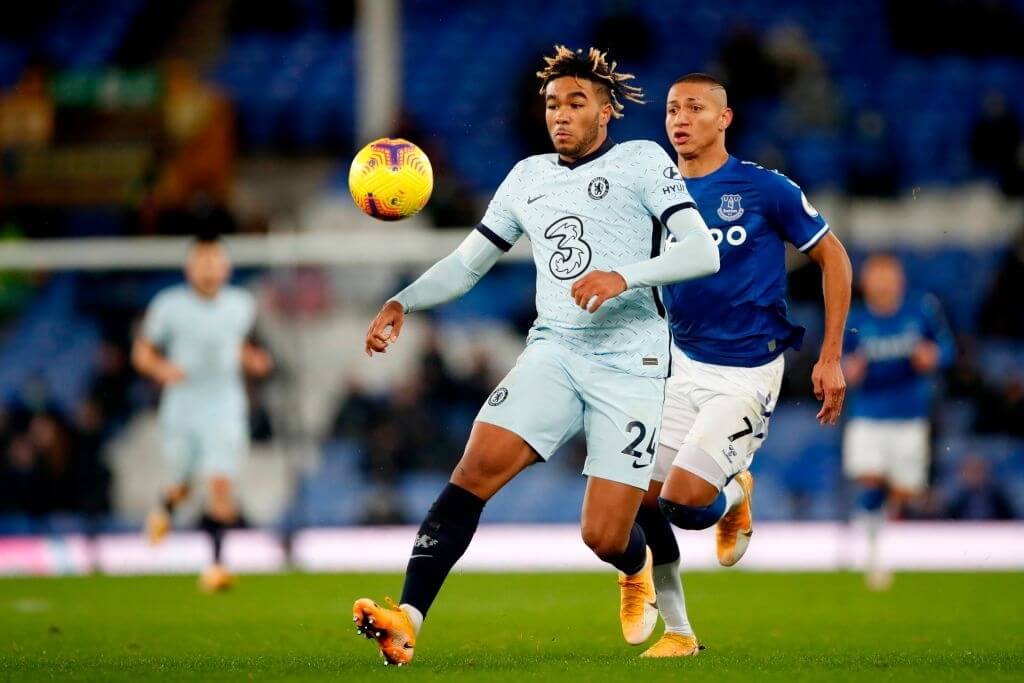 Chelsea's English defender Reece James (C) vies for the ball against Everton's Brazilian striker Richarlison (R) during the English Premier League football match between Everton and Chelsea at Goodison Park in Liverpool, north west England on December 12, 2020. 