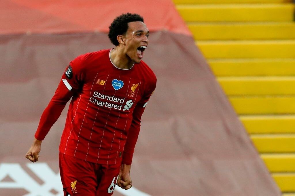 Liverpool's English defender Trent Alexander-Arnold celebrates scoring their second goal during the English Premier League football match between Liverpool and Chelsea at Anfield in Liverpool, north west England on July 22, 2020. 