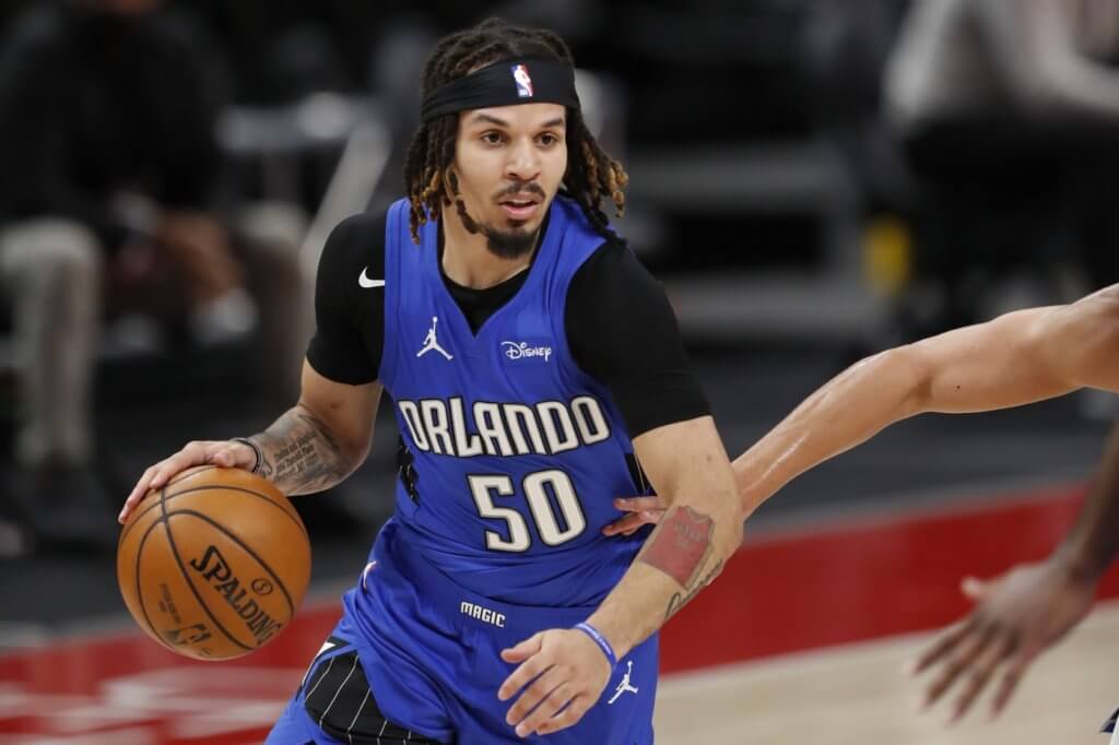 May 3, 2021; Detroit, Michigan, USA; Orlando Magic guard Cole Anthony (50) dribbles the ball during the third quarter against the Detroit Pistons at Little Caesars Arena. Mandatory Credit: Raj Mehta-USA TODAY Sports