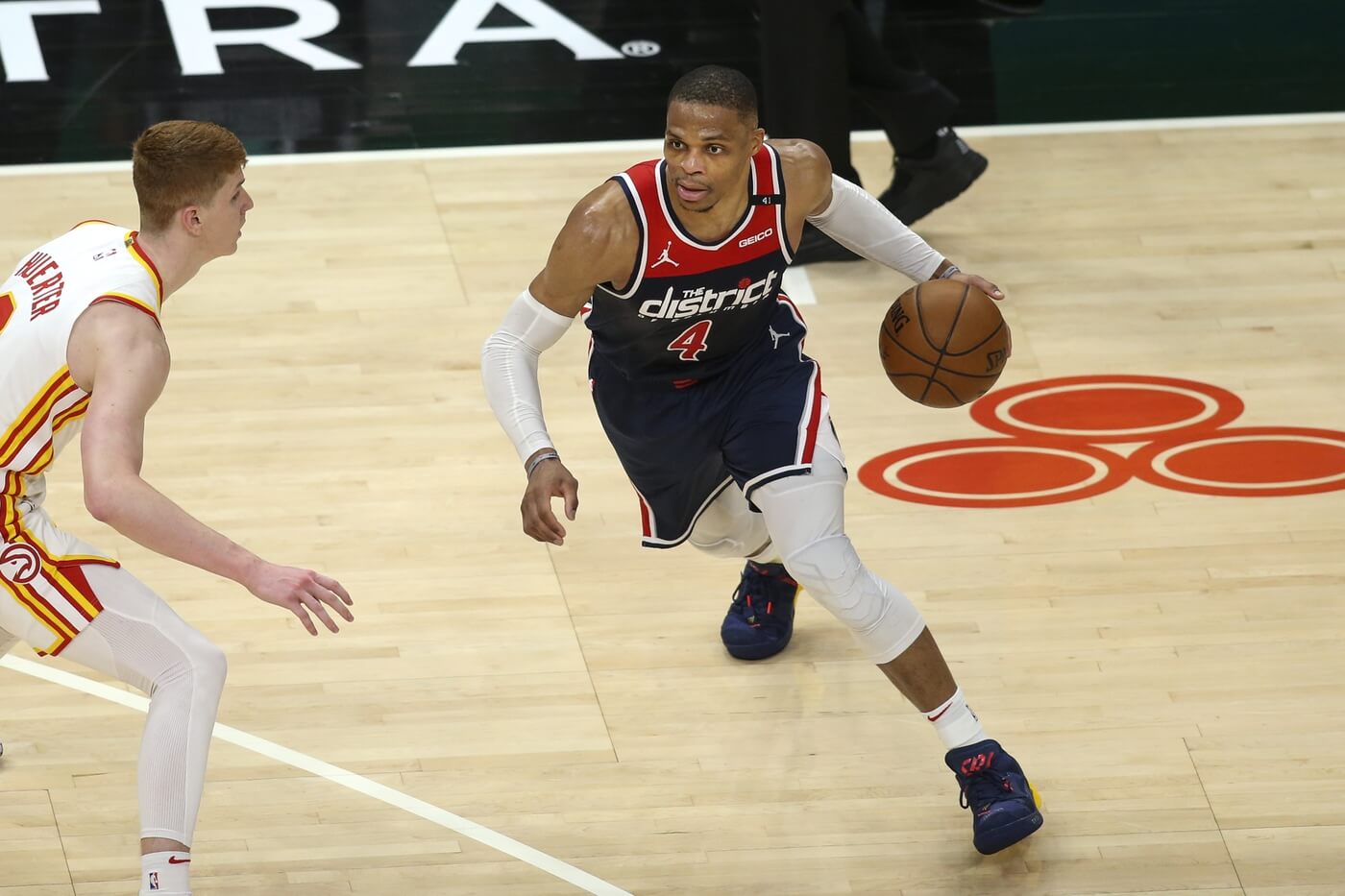 May 10, 2021; Atlanta, Georgia, USA; Washington Wizards guard Russell Westbrook (4) is defended by Atlanta Hawks guard Kevin Huerter (3) in the fourth quarter at State Farm Arena. Mandatory Credit: Brett Davis-USA TODAY Sports