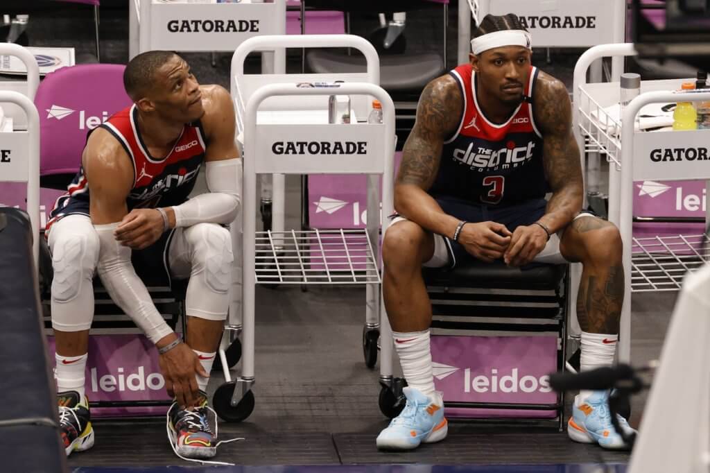 May 3, 2021; Washington, District of Columbia, USA; Washington Wizards guard Russell Westbrook (4) and Wizards guard Bradley Beal (3) sit on the bench in the final seconds of the fourth quarter against the Indiana Pacers at Capital One Arena. Mandatory Credit: Geoff Burke-USA TODAY Sports