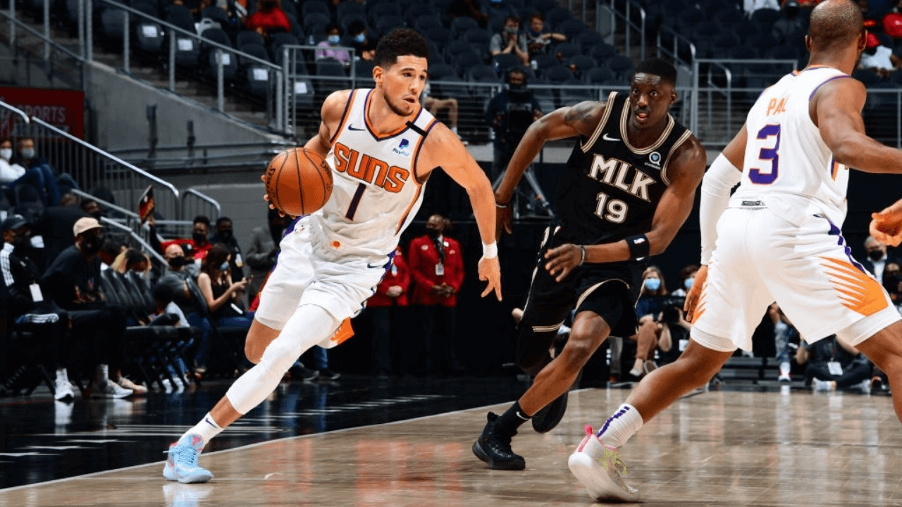 ATLANTA, GA - MAY 5: Devin Booker #1 of the Phoenix Suns drives to the basket against the Atlanta Hawks on May 5, 2021 at State Farm Arena in Atlanta, Georgia. NOTE TO USER: User expressly acknowledges and agrees that, by downloading and/or using this Photograph, user is consenting to the terms and conditions of the Getty Images License Agreement. Mandatory Copyright Notice: Copyright 2021 NBAE (Photo by Scott Cunningham/NBAE via Getty Images)