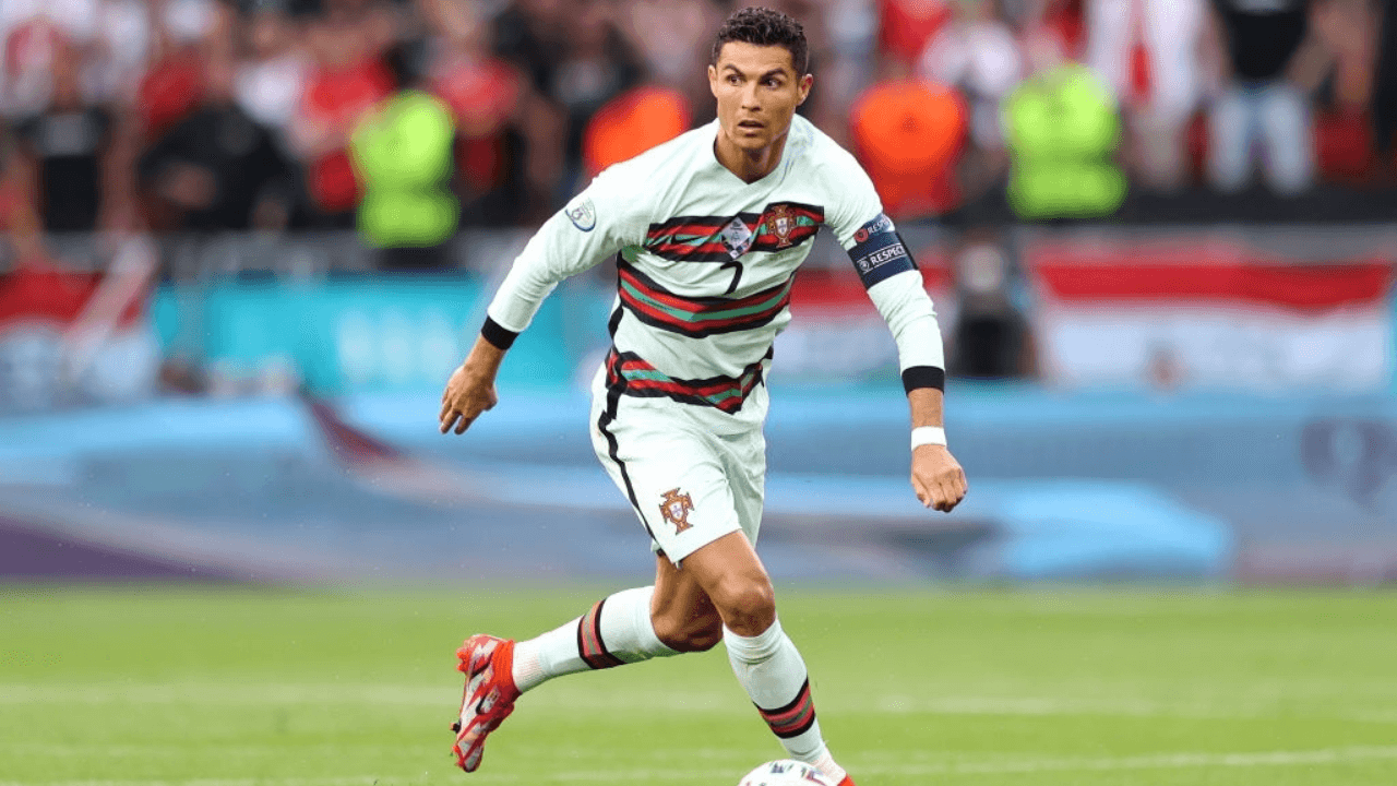 BUDAPEST, HUNGARY - JUNE 15: Cristiano Ronaldo of Portugal on the ball during the UEFA Euro 2020 Championship Group F match between Hungary and Portugal at Puskas Arena on June 15, 2021 in Budapest, Hungary. (Photo by Alex Pantling/Getty Images)
