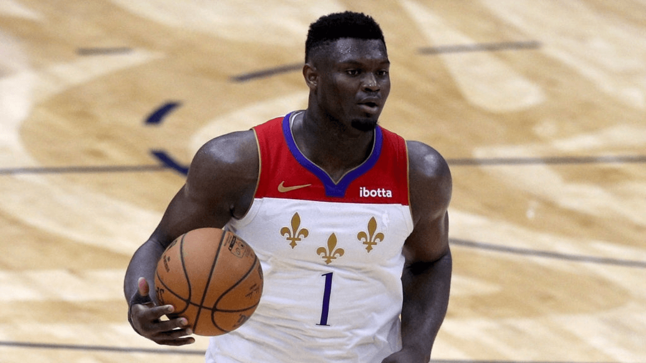 NEW ORLEANS, LOUISIANA - MAY 04: Zion Williamson #1 of the New Orleans Pelicans dribbles the ball downn court during the fourth quarter of an NBA game against the Golden State Warriors at Smoothie King Center on May 04, 2021 in New Orleans, Louisiana. NOTE TO USER: User expressly acknowledges and agrees that, by downloading and or using this photograph, User is consenting to the terms and conditions of the Getty Images License Agreement. (Photo by Sean Gardner/Getty Images)