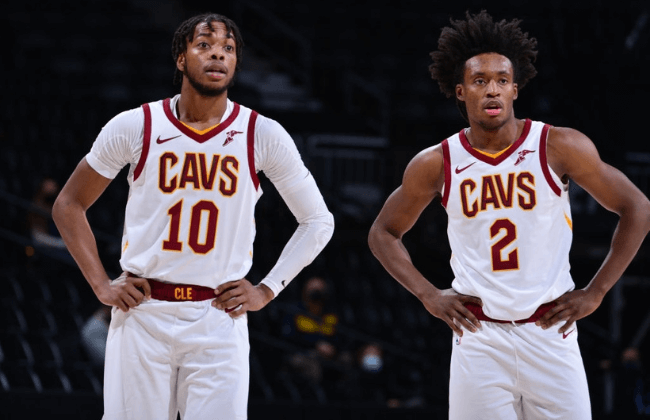 DENVER, CO - FEBRUARY 10: Darius Garland #10 and Collin Sexton #2 of the Cleveland Cavaliers look on during the game against the Denver Nuggets on February 10, 2021 at the Ball Arena in Denver, Colorado. NOTE TO USER: User expressly acknowledges and agrees that, by downloading and/or using this Photograph, user is consenting to the terms and conditions of the Getty Images License Agreement. Mandatory Copyright Notice: Copyright 2021 NBAE (Photo by Bart Young/NBAE via Getty Images)