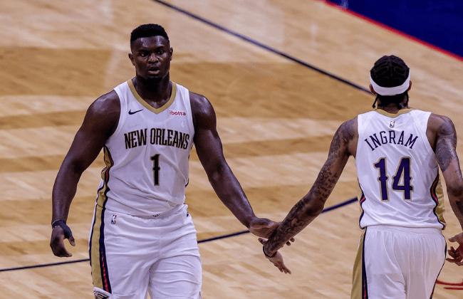 Apr 26, 2021; New Orleans, Louisiana, USA; New Orleans Pelicans forward Zion Williamson (1) is congratulated by forward Brandon Ingram (14) after making a three point basket against LA Clippers during the second half at the Smoothie King Center. Mandatory Credit: Stephen Lew-USA TODAY Sports.