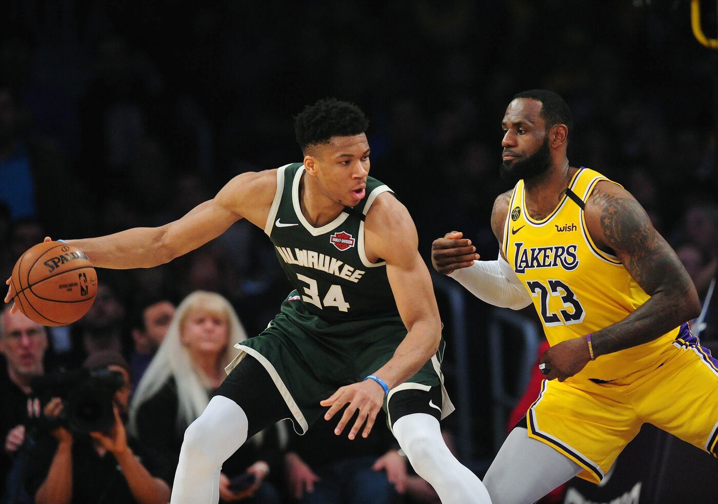 March 6, 2020; Los Angeles, California, USA; Milwaukee Bucks forward Giannis Antetokounmpo (34) controls the ball against Los Angeles Lakers forward LeBron James (23) during the first half at Staples Center. Mandatory Credit: Gary A. Vasquez-USA TODAY Sports