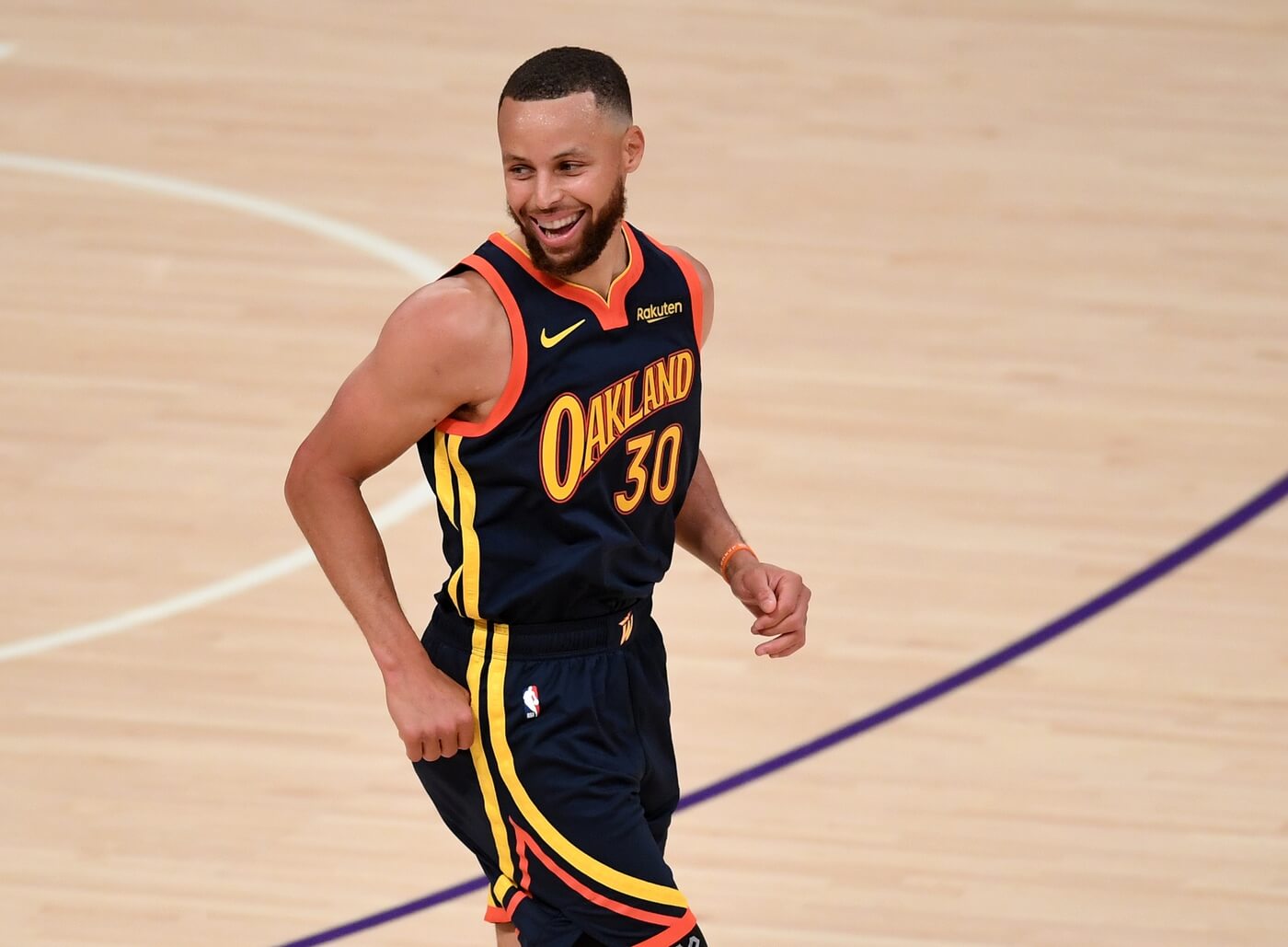 May 19, 2021; Los Angeles, California, USA; Golden State Warriors guard Stephen Curry (30) smiles after shooting a basket over Los Angeles Lakers forward LeBron James (23) in the first half of the game at Staples Center. Mandatory Credit: Jayne Kamin-Oncea-USA TODAY Sports
